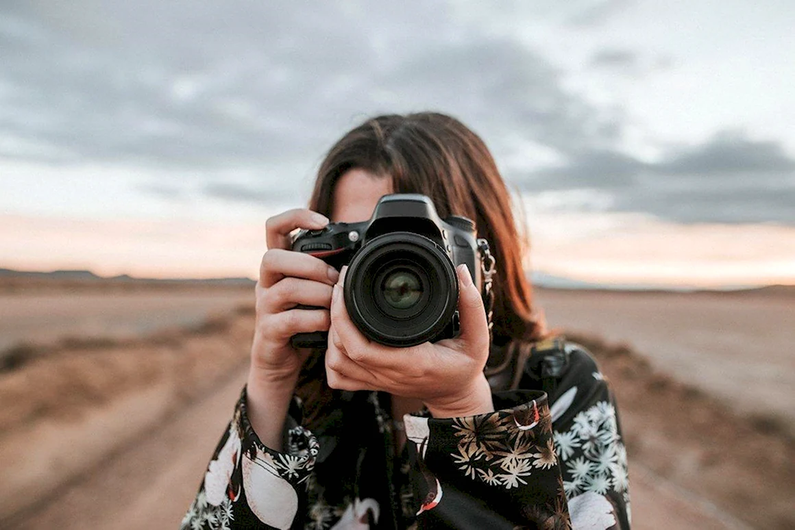Девушка фотограф