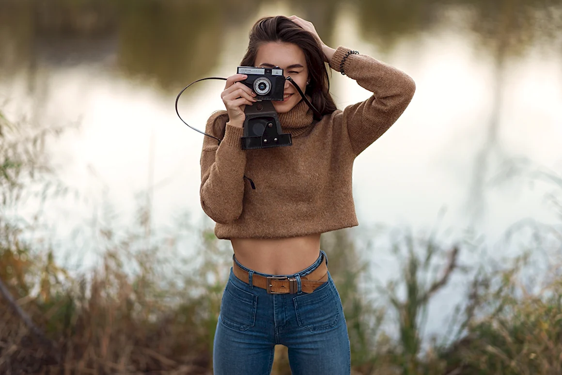 Девушка с фотоаппаратом