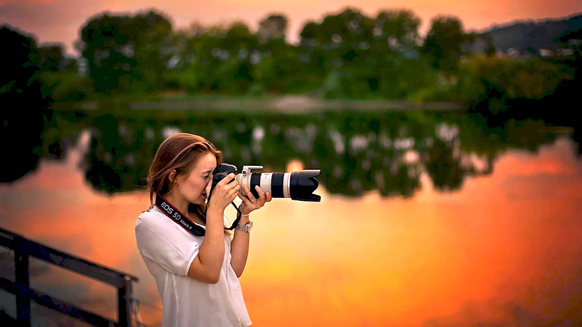 Девушка с фотоаппаратом