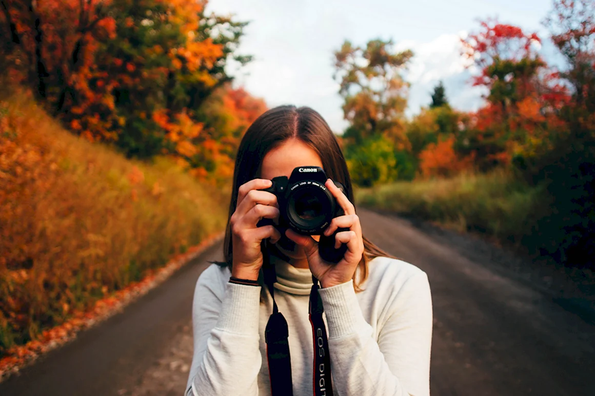 Девушка с фотоаппаратом
