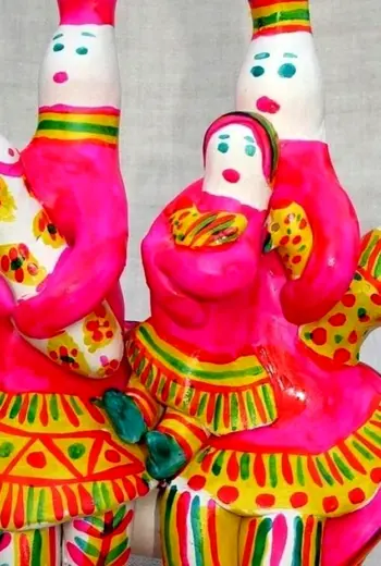 Филимоновская игрушка барышня