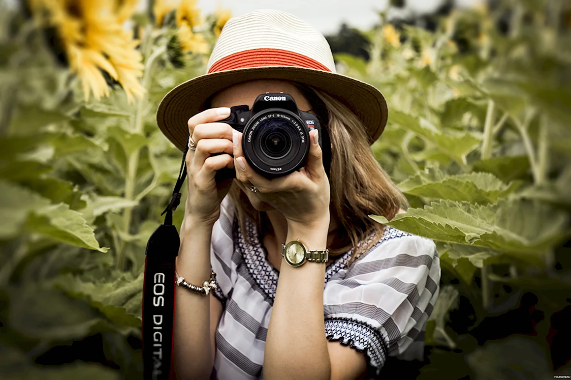 Фотограф с фотоаппаратом