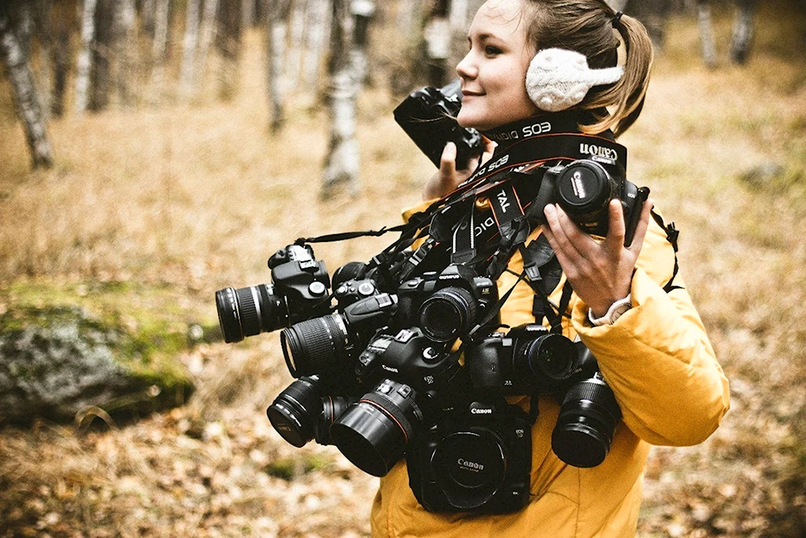 Фотограф с фотоаппаратом