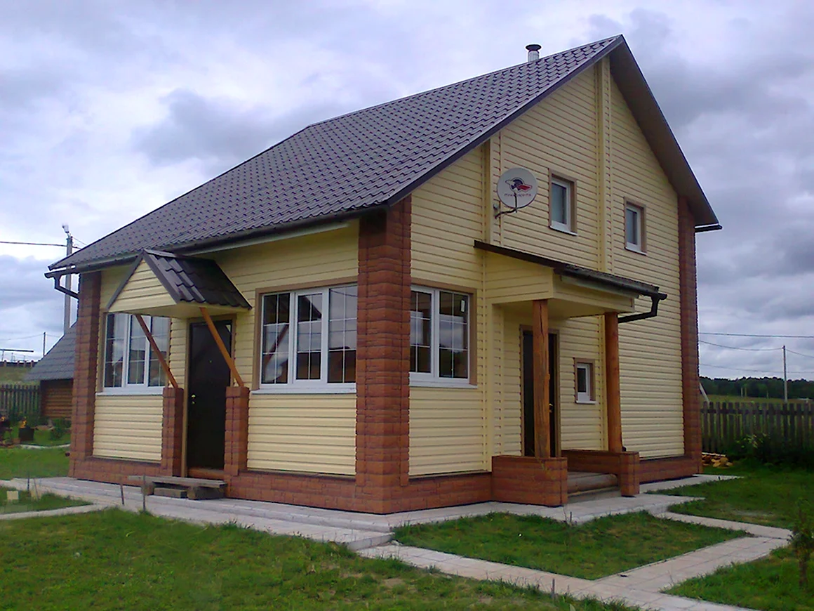 Комбинированная отделка сайдингом