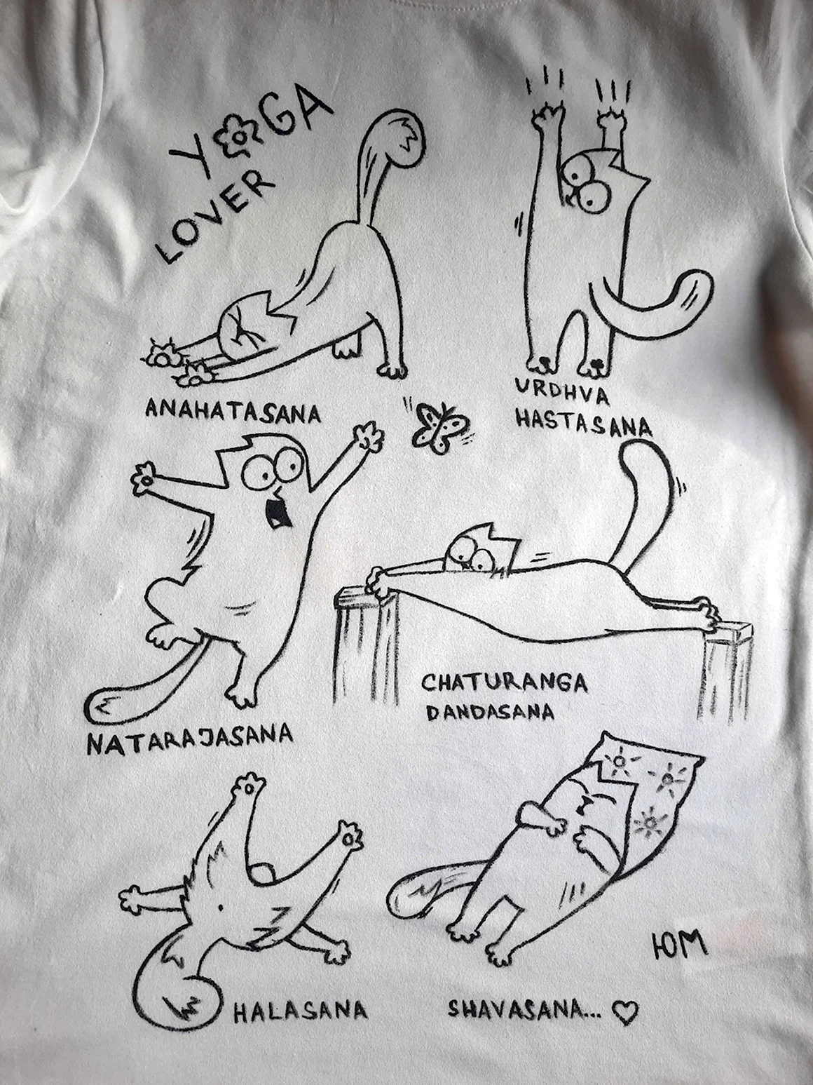 Кот Саймон в постели