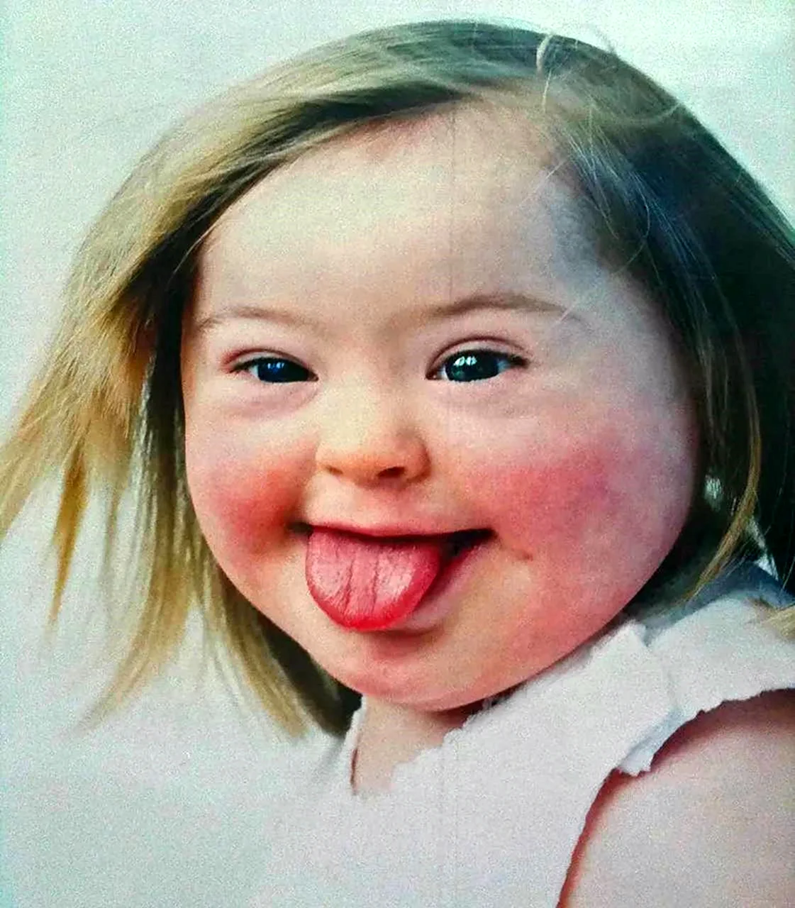 Лица детей даунов
