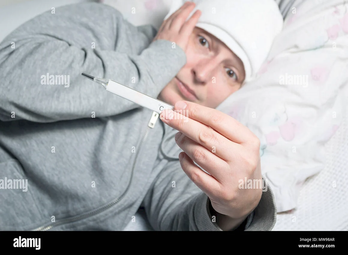 Парень с градусником