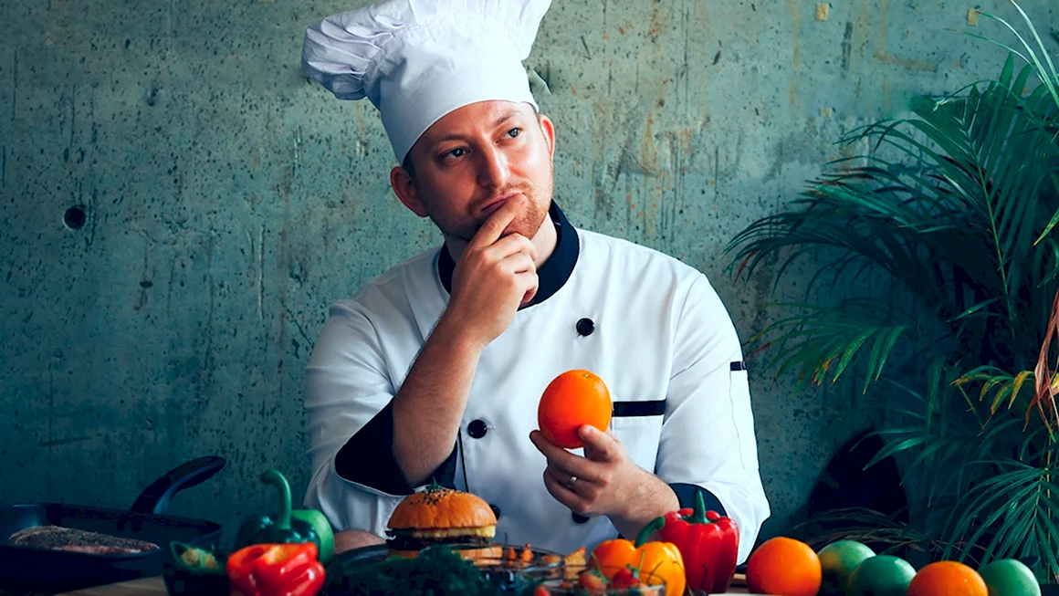 Повар с овощами