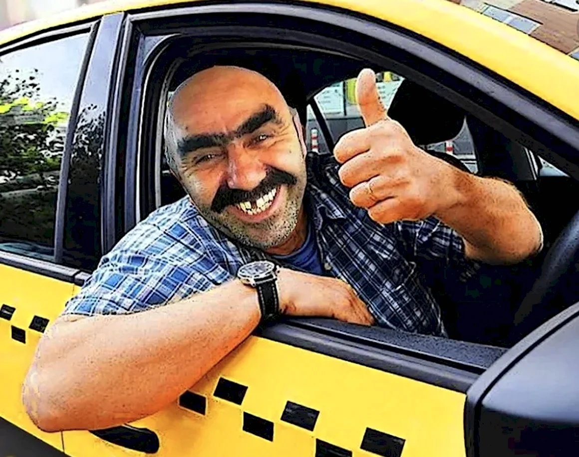 Таксист